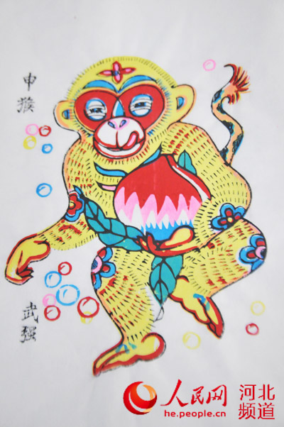 图为武强木版年画传人康英勤为猴年设计的年画图片