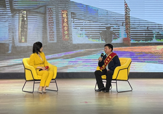 劳模工匠王檀讲述个人事迹。 赵阳摄