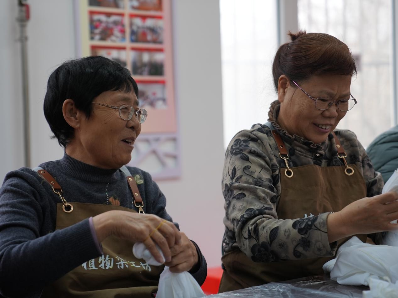 活動現場，居民喜笑顏開。劉一明攝
