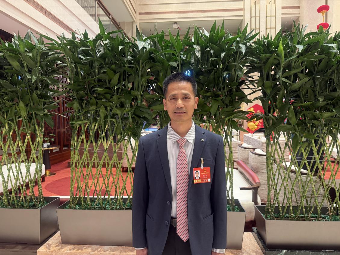 全國人大代表、大元建業集團股份有限公司第二分公司木工班班長周培。受訪者供圖
